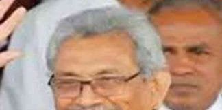 President Gotabaya Rajapaksa hands over his signature to senior official