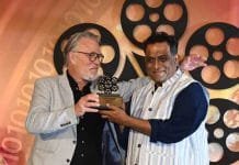 Anurag Basu, singer Yohani and Warda Nadiadwala win at IIFTC 2022 Anurag receiving the award from Mikael Svensson