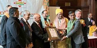Dr. Sundeep Jain Honored with Bharat Gaurav Award at British Parliament in London Dr.Sundeep Jain receiving the award in London