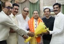 India: The Global Beacon of Spirituality and Music, According to Kailash Kher An array of dignitaries at the event, including Sanjay Rathi, State President of the Haryana Union of Journalists, highlighting the significance of the gathering