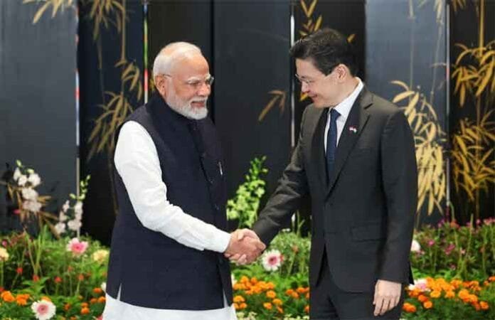 PM Modi with the Prime Minister of Singapore, Lawrence Wong, in Singapore