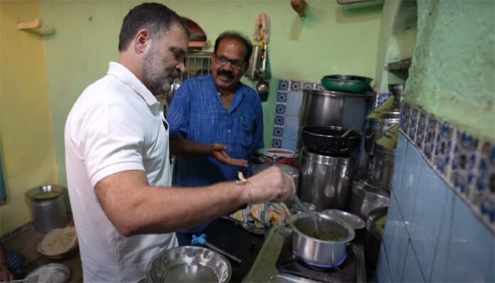 Rahul-Gandhi-shares-a-meal- Rahul Gandhi shares a meal with a Dalit family, showcasing culinary traditions and advocating for the protection of constitutional rights in a viral video