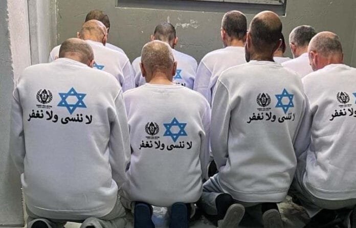 Palestinian Prisoners Wearing Shirts Stating 