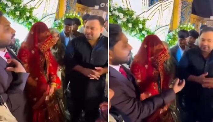 khan-sir-secret-wedding-tej Khan Sir and Tejashwi Yadav sharing a laugh at the secret wedding reception.