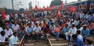 Nationwide Trade Union Strike Disrupts Key Services: Banking, Postal, Rail, and Roads Hit rotesters block major roads during India’s nationwide strike—Essential services hit hard.