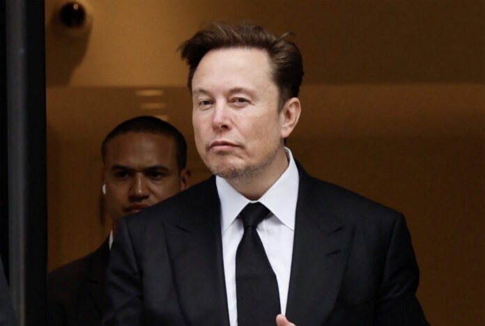 Elon Musk talking about AI and future of work, robots automating industries, AI technology revolution 2025