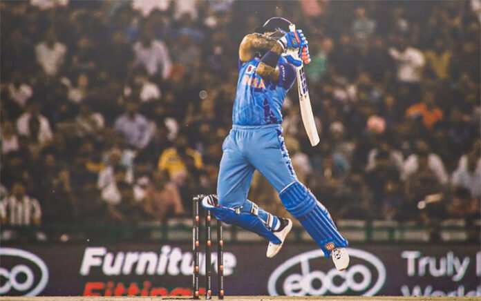 Suryakumar-Yadav-hitting-a- Suryakumar Yadav hitting a six during India vs Australia T20 match in Vizag 2025