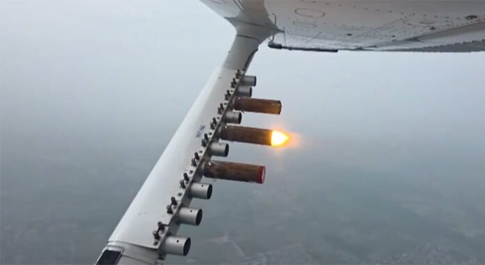 delhi-artificial-rain-aqi-p Aircraft spraying cloud-seeding solution over Delhi skies October 2025