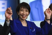 Sanae Takaichi Elected Japan’s First Female PM, Marks Hard‑Right Policy Shift anae Takaichi waving to supporters after being elected Japan’s first female Prime Minister