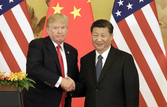 trump-xi-summit-2025-trade- US President Trump and China’s Xi Jinping shake hands after historic trade deal talks in Singapore