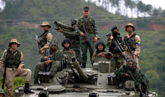 Venezuelan soldiers mobilizing near the coast in response to U.S. naval presence.