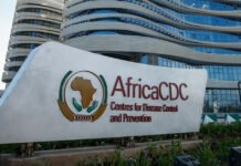 Africa Faces Deadliest Cholera Crisis in a Quarter-Century — Over 7,000 Lives Lost as Cases Surge 30% African health worker administering cholera vaccine in urban clinic, 2025