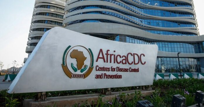 African health worker administering cholera vaccine in urban clinic, 2025