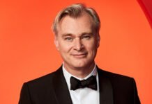 Christopher Nolan Announces His Next Film ‘Omega’ — A Philosophical Sci-Fi Thriller Set Across Two Universes Christopher Nolan at Universal Studios announcing his next film Omega, a two-universe philosophical sci-fi thriller.