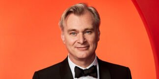 Christopher Nolan Announces His Next Film ‘Omega’ — A Philosophical Sci-Fi Thriller Set Across Two Universes Christopher Nolan at Universal Studios announcing his next film Omega, a two-universe philosophical sci-fi thriller.