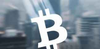 Bitcoin Slumps Sharply, Wiping Out 2025 Gains in Its Worst Monthly Drop Since 2022 Bitcoin coin graphic showing price decline during a major market downturn.