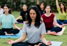 India Sets 3 Guinness World Records Under ‘Swasth Nari’ Campaign — A Triumph of Women’s Health and Unity Thousands of women performing yoga during India’s Swasth Nari campaign event 2025.” Image: Guinness World Records certificate ceremony