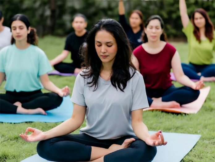 Women taking part in yoga during Swasth Nari event Thousands of women performing yoga during India’s Swasth Nari campaign event 2025.” Image: Guinness World Records certificate ceremony