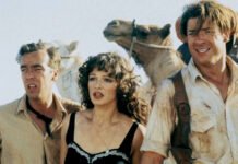 The Mummy Returns Again”: Brendan Fraser and Rachel Weisz Reunite as Universal Reboots 1999 Classic “Brendan Fraser and Rachel Weisz standing amid ancient Egyptian ruins with the iconic mummy symbol glowing behind them — poster for The Mummy Reboot 2026.”