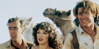 The Mummy Returns Again”: Brendan Fraser and Rachel Weisz Reunite as Universal Reboots 1999 Classic “Brendan Fraser and Rachel Weisz standing amid ancient Egyptian ruins with the iconic mummy symbol glowing behind them — poster for The Mummy Reboot 2026.”