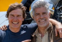 Tom Cruise Confirms Space Film Project With NASA and SpaceX — Shooting to Begin on Real ISS in 2026 Tom Cruise with SpaceX rocket in background, discussing his upcoming NASA-backed space film during a press event in Los Angeles.