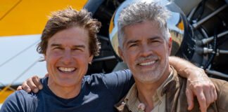 Tom Cruise Confirms Space Film Project With NASA and SpaceX — Shooting to Begin on Real ISS in 2026 Tom Cruise with SpaceX rocket in background, discussing his upcoming NASA-backed space film during a press event in Los Angeles.