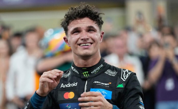 Lando Norris celebrates after winning the 2025 Formula One World Championship at the Abu Dhabi Grand Prix.