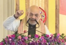 Amit Shah Raises Infiltration Issue in Assam, Urges Voters to Give BJP ‘One More Chance’ Union Home Minister Amit Shah addresses a public rally in Assam ahead of assembly elections.