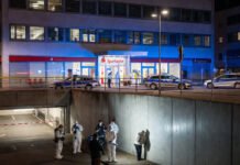 Hollywood-Style Bank Heist in Germany: Thieves Drill Into Underground Vault, Break 3,000 Safe Deposit Boxes German police outside Sparkasse bank after Hollywood-style vault heist