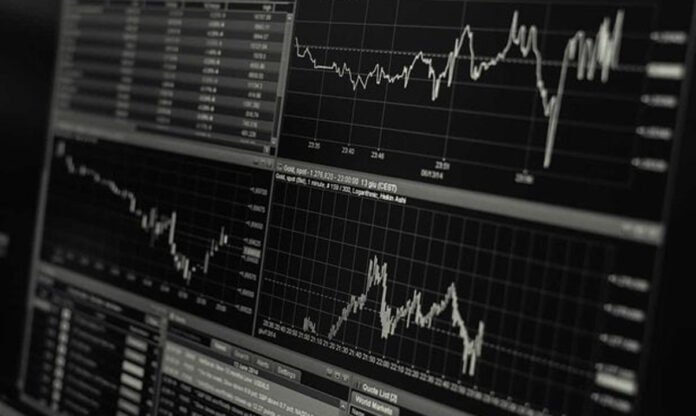 Global Stock Market Reaction to US Data and Fed Rate Speculation, Dec 1, 2025 Traders monitoring fluctuating global stock indices on December 1, 2025 amid cautious market sentiment.