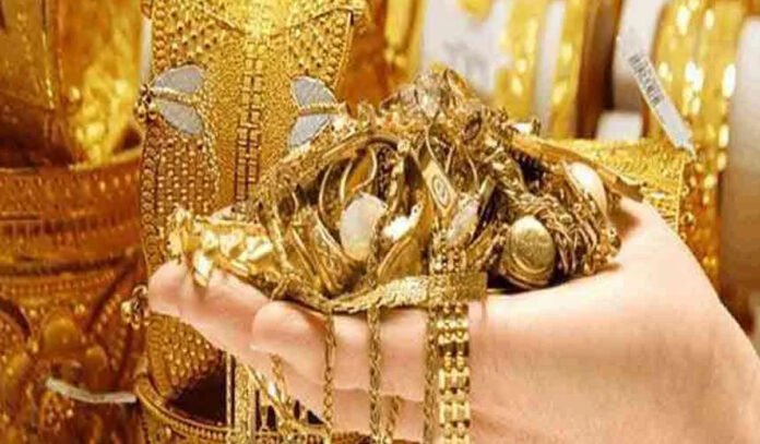 Stacked gold and silver bullion bars with rising price chart showing record highs in December 2025