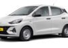 Hyundai Launches Prime Taxi Range With Factory-Fitted CNG in India: Price, Features, Specs Explained Hyundai Prime Taxi range with factory-fitted CNG parked outside a Hyundai dealership in India, showcasing Prime HB hatchback and Prime SD sedan models.