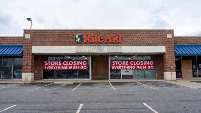 Closed storefront of a Rite Aid pharmacy symbolizing 2025 US corporate bankruptcies