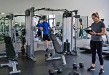 Wellness Trends 2025: Experts Predict Shift to Longevity, Strength Training, and Sustainable Fitness Habits Wellness trends 2025 showing strength training, recovery workouts, and wearable health technology