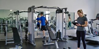 Wellness Trends 2025: Experts Predict Shift to Longevity, Strength Training, and Sustainable Fitness Habits Wellness trends 2025 showing strength training, recovery workouts, and wearable health technology