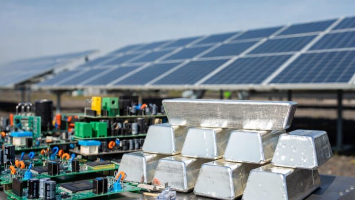 Silver bars and solar panels symbolizing silver’s role in industry and energy transition