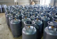New Year Shock: Commercial LPG Cylinder Prices See Biggest Hike in 28 Months Commercial LPG gas cylinders stacked outside an Indian gas agency after price hike