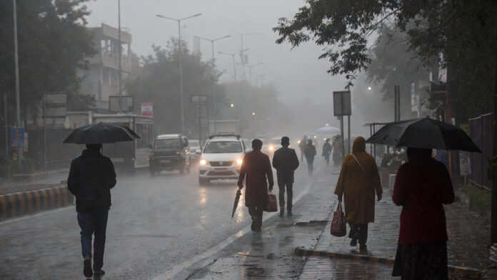 Rainy morning in Delhi with fog and cold winds affecting daily life