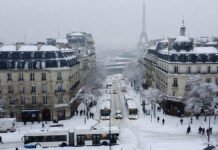 Heavy Snow and Ice Paralyze Europe, Flights Canceled, Roads Shut, Rail Services Disrupted Snow-covered Paris streets as winter storm disrupts travel across Europe