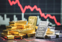 Gold, Silver Prices Slide on Profit Booking; Silver Crashes Over 7%, Gold Drops More Than 1% Gold and silver bars displayed with falling price chart amid market correction