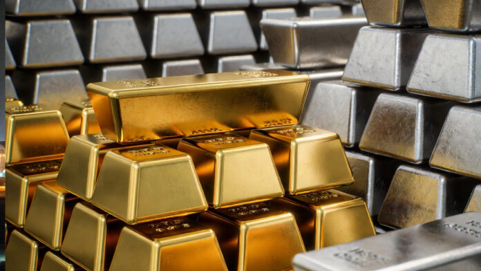 Gold and silver bars displayed at a bullion market in Delhi as prices hit record highs