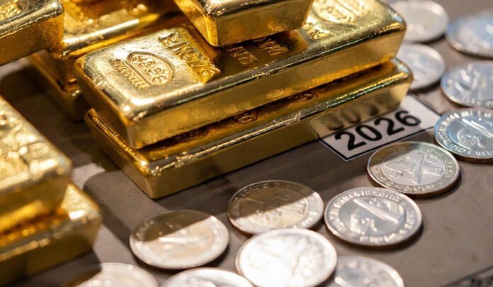 Gold bars and silver coins with rising gold prices in Indian market, January 2026