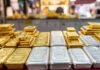 Global Market Turmoil Triggers Major Shake-Up in India’s Gold and Silver Prices — Check Today’s Latest Rates Before Buying Gold and silver bars displayed at an Indian bullion market amid rising prices