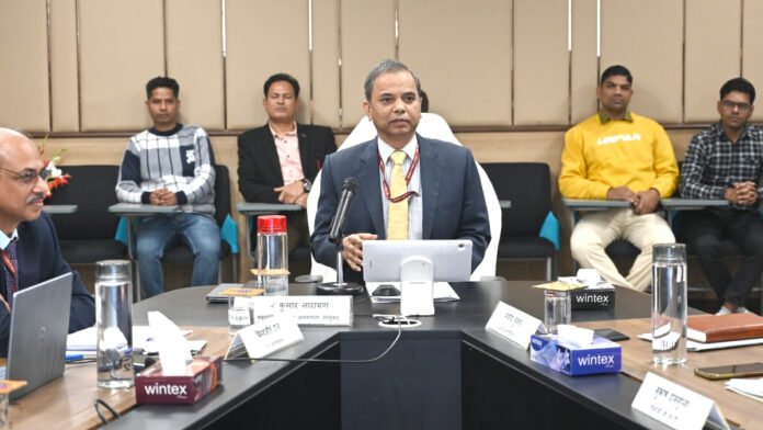 Indian census enumerator collecting household data during a population survey