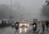 India Weather Update January 7, 2026: Cold Wave, Dense Fog Across North and East, Rain Likely in Tamil Nadu Dense winter fog covering a highway in North India during cold wave conditions