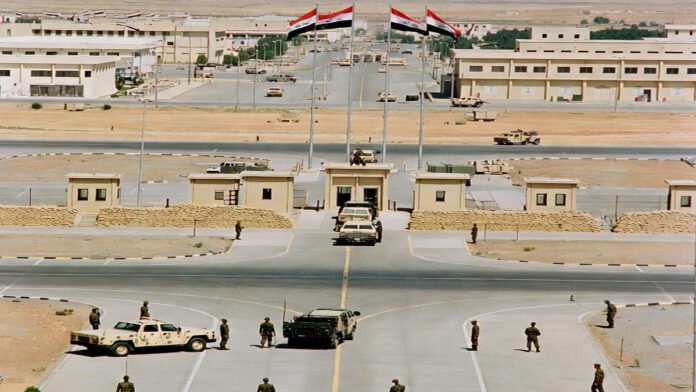 Iraqi soldiers take charge at Ayn al-Asad Air Base after full US troop withdrawal under bilateral agreement.