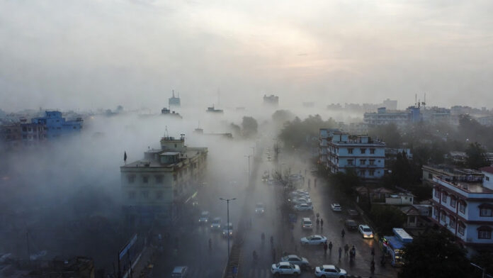 Dense fog and cold wave conditions reduce visibility on a winter morning in North India.