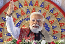 PM Modi Declares Bengal ‘Ready for Change’ as He Unveils Major Development Push at Singur Rally PM Narendra Modi addressing a public rally in Singur, West Bengal, highlighting new development projects.