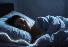 Want Better Sleep in 2026? Scientists Reveal High-Tech ‘Sleep Hygiene’ Methods That Actually Work Person practicing modern sleep hygiene with smart lighting and calm bedroom setup