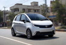 Tata Nano EV Buzz Takes Over Auto Market: Electric Comeback Rumors Spark Massive Excitement Concept image of Tata Nano electric car in a modern city setting